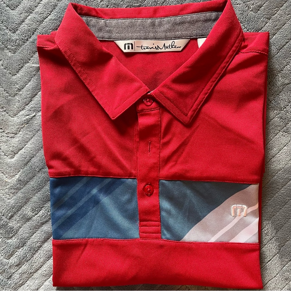 Travis Matthew Polo Shirt. Red W/ Blue,Grey,White Diagonal Lines. Size XL.